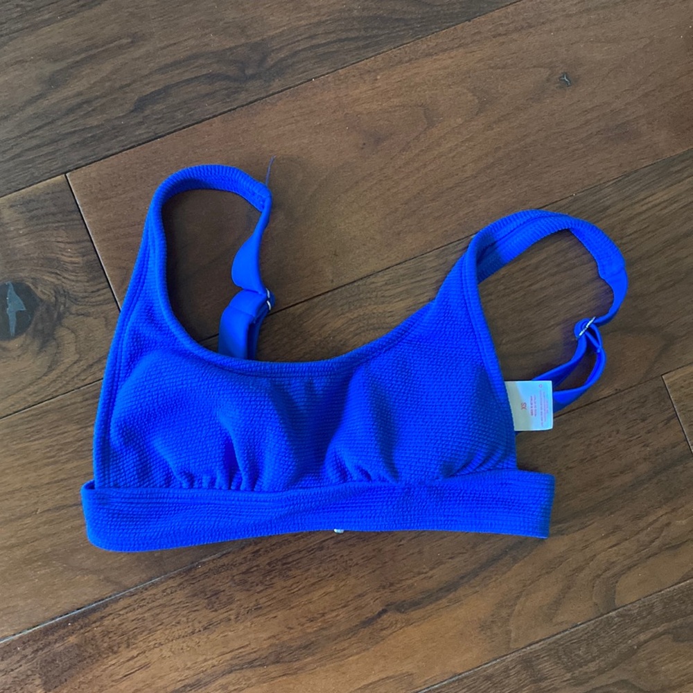 Adjustable blue target bikini top